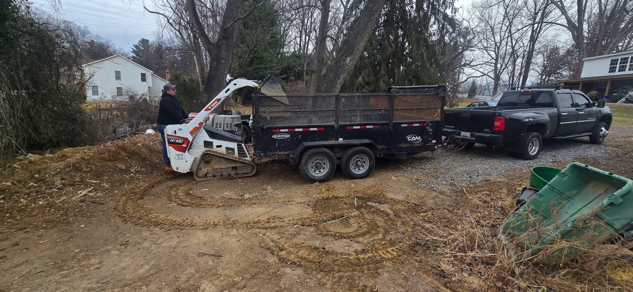 Completed heavy-duty site clearing and debris hauling work